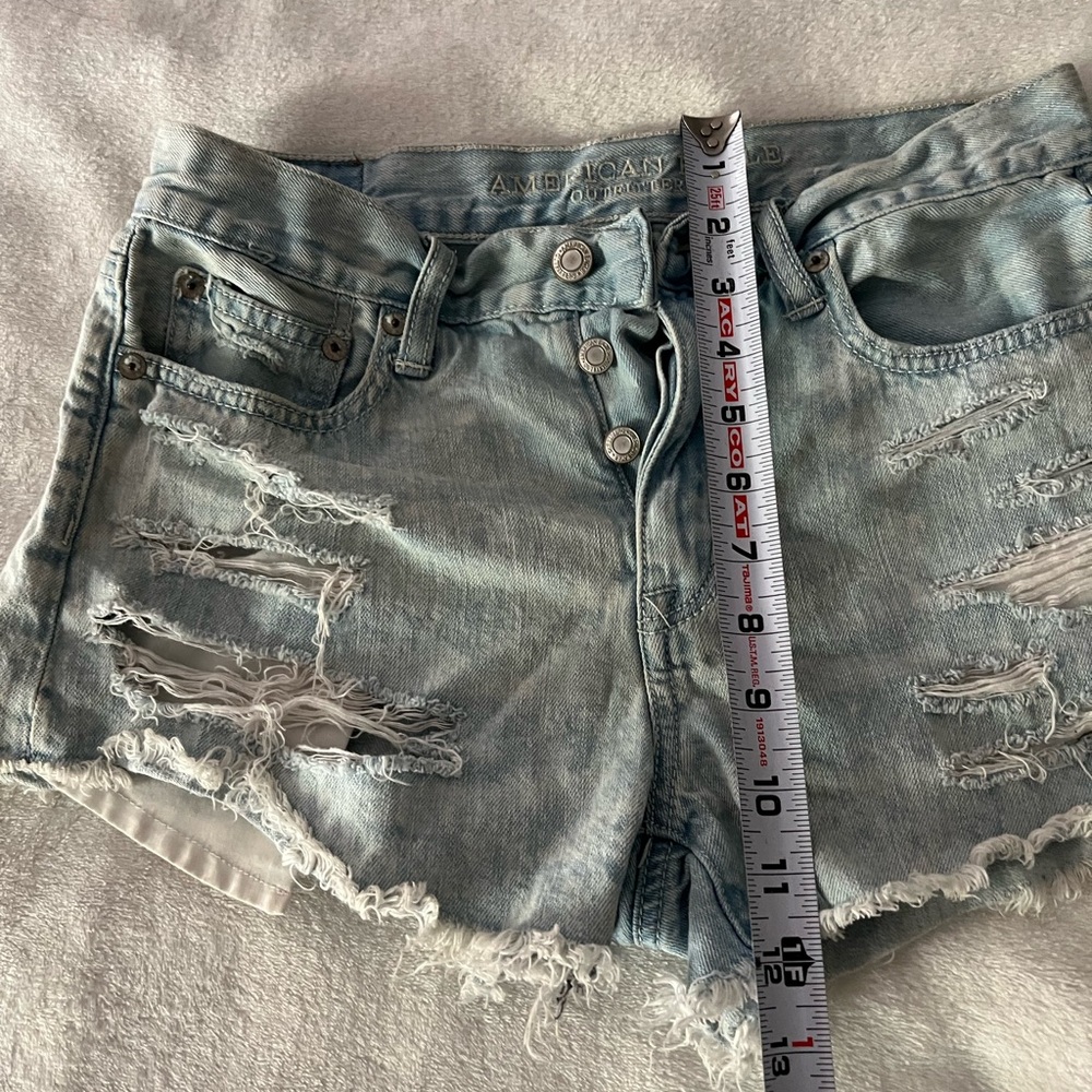 American Eagle Outfitters Light Wash Distressed Denim Cutoff Shorts - Picture 6 of 12